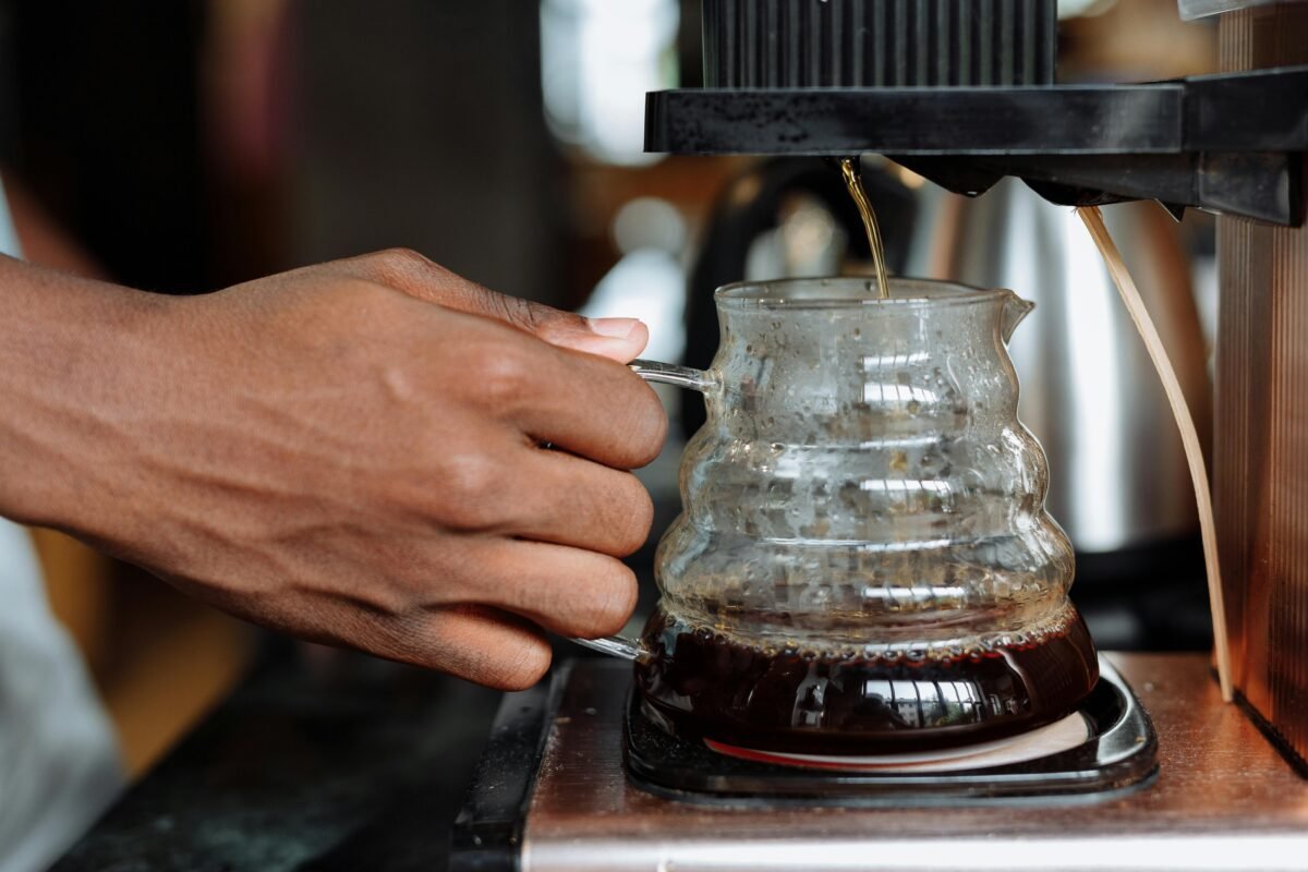 A Person Brewing Coffee